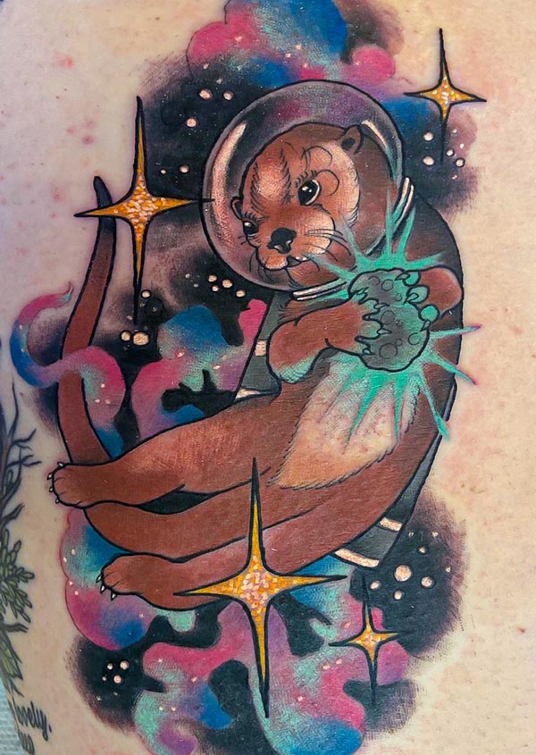 Lauren's colorful Otter Space Tattoo