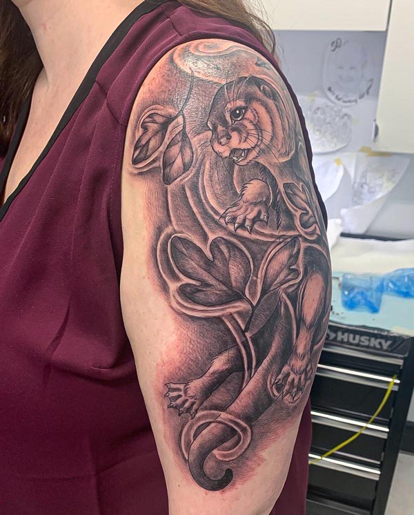 Otter-swimming-in-leaves-left Otter swimming in leaves tattoo Right